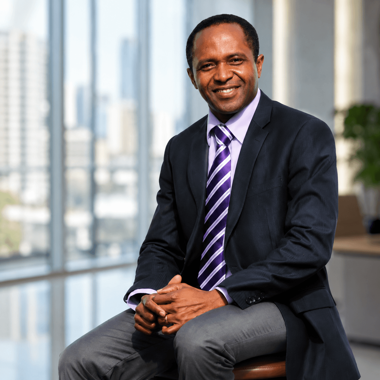 RICHSAM leadership portrait with brand artwork